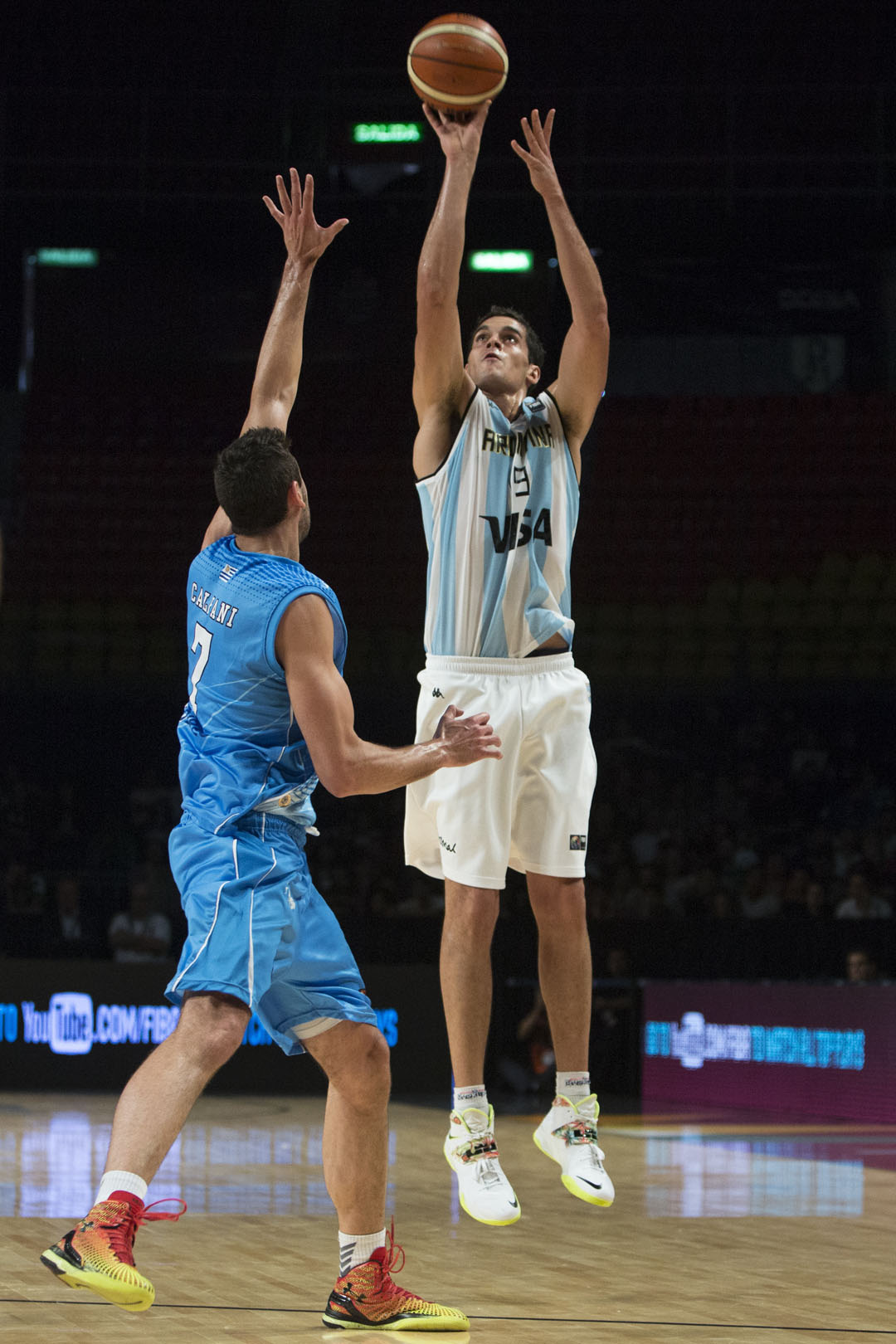 MEXICO CITY, MEXICO - SEPTEMBER 06: Leonardo Mainoldi of Argentina shootsagainst Mathias Calfani of Uruguay during a second stage match between Argentina and Uruguay as part of the 2015 FIBA Americas Championship for Men at Palacio de los Deportes on September 06, 2015 in Mexico City, Mexico. (Photo by Miguel Tovar/LatinContent/Getty Images)