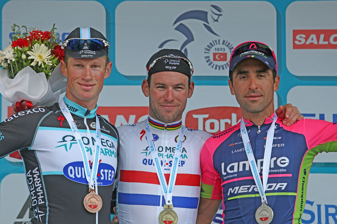 MUGLA, TURKEY - APRIL 30: (L-R) Mark Renshaw of Australia and Omega Pharma-Quickstep, stage winner Mark Cavendish of Great Britain and Omega Pharma-Quickstep and Ariel Maximiliano Richeze of Argentina and Lampre Merida pose on the podium after the 4th stage of the 50th Presidential Cycling Tour a 132 km stage between Fethiye to Marmaris on April 30, 2014, in the Eagean resorty city of Mugla, Turkey. (Photo by Ozgu Ozdemir - Velo/Getty Images)
