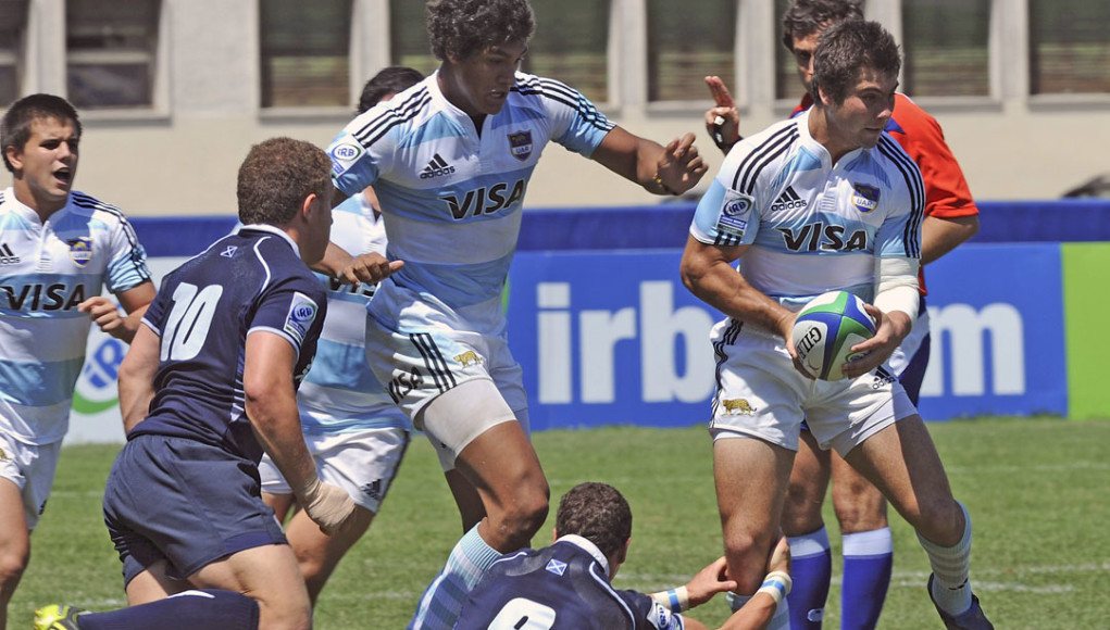 ROVIGO, ITALY - JUNE 26: Javier Rojas of Argentina (R) is tackled by Sean Kennedy of Scotland during the IRB Junior World Championship 9th Place Play Off match between Scotland and Argentina at Mario Battaglini Stadium on June 26, 2011 in Rovigo, Italy. (Photo by Dino Panato/Getty Images)