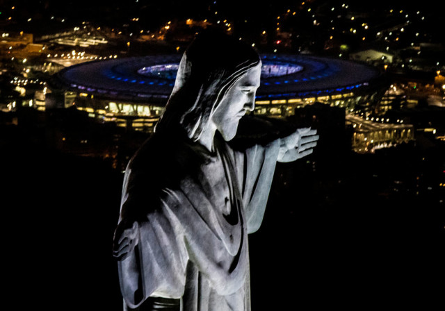 RIO DE JANEIRO, BRAZIL - JULY 31: The Christ the Redeemer statue and Maracana Stadium are seen on July 31, 2016 in Rio de Janeiro, Brazil. Rio 2016 will be the first Olympic Games in South America. The games begin August 5. (Photo by Buda Mendes/Getty Images)